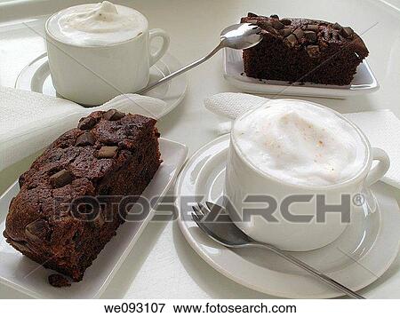 Chocolate brownie and Capuccino View Large Photo Image Stock Photo - Chocolate brownie and Capuccino. Fotosearch