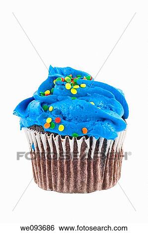 Chocolate cupcake with blue colored frosting and sprinkles on white background View Large Photo Image Stock Photograph - Chocolate cupcake with blue colored frosting and sprinkles on white background. Fotosearch