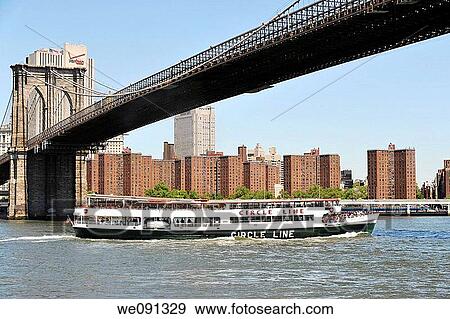 Circle Line Sightseeing Boat passing under the Brookllyn Bridge, New York City, USA View Large Photo Image Stock Photo - Circle Line Sightseeing Boat passing under the Brookllyn Bridge, New York City, USA. Fotosearch