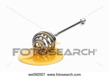 Clear honey on drizzler View Large Photo Image Stock Photo - Clear honey on drizzler. Fotosearch