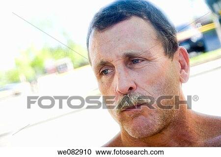 Close_up of a shirtless young man with a mustache. View Large Photo Image Stock Image - Close_up of a shirtless young man with a mustache.. Fotosearch