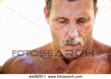 Close_up of a shirtless young man with a mustache. View Large Photo Image Stock Image - Close_up of a shirtless young man with a mustache.. Fotosearch