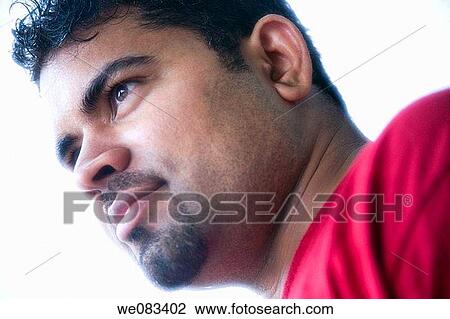 Close_up of a young Indian man. View Large Photo Image Stock Image - Close_up of a young Indian man.. Fotosearch