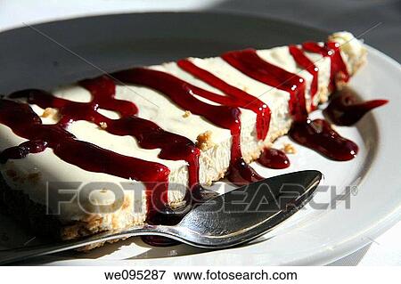 Closeup of cheese cake with jam on a plate View Large Photo Image Stock Photo - Closeup of cheese cake with jam on a plate. Fotosearch