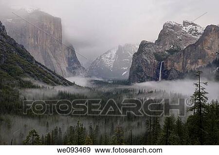 Clouds and fog in Yosemite Valley after a winter rain storm seen from Tunnel View View Large Photo Image Stock Photo - Clouds and fog in Yosemite Valley after a winter rain storm seen from Tunnel View. Fotosearch