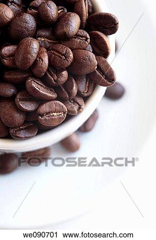 Coffee beans and cup View Large Photo Image Stock Image - Coffee beans and cup. Fotosearch
