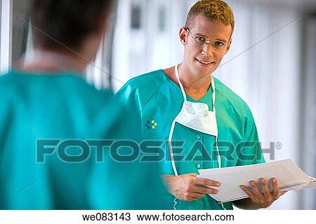 colleague, doctor, dossier View Large Photo Image Stock Image - colleague, doctor, dossier. Fotosearch