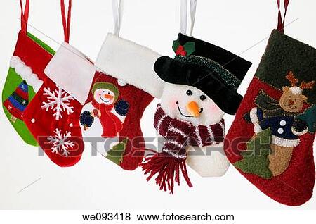 Collection of unique Christmas stockings with snowmen hanging on white background sharp View Large Photo Image Stock Photo - Collection of unique Christmas stockings with snowmen hanging on white background sharp. Fotosearch