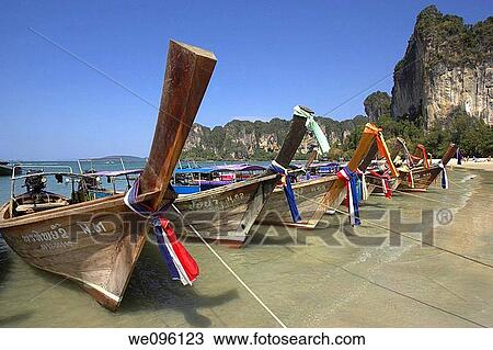 Colourful Long Tail Boats, Railay West Beach, Krabi, Thailand View Large Photo Image Stock Image - Colourful Long Tail Boats, Railay West Beach, Krabi, Thailand. Fotosearch