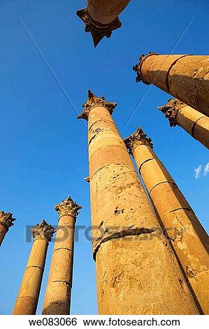 Stock Photograph - COLUMNS ROMAN TEMPLE RUINS OF ARTEMIS JERASH JORDAN. Fotosearch