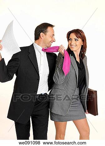 Comerciales bromeando en el trabajo View Large Photo Image Stock Photo - Comerciales bromeando en el trabajo. Fotosearch