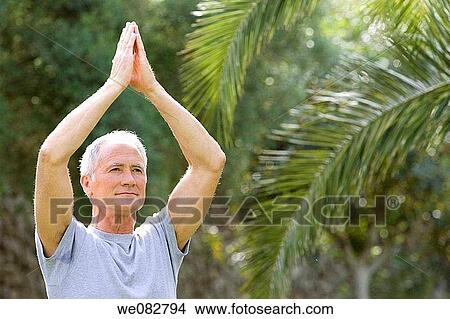 concentrate, concentration, Arms raised View Large Photo Image Picture - concentrate, concentration, Arms raised. Fotosearch