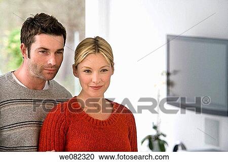 Stock Image - contemporary, couple, at-home. Fotosearch