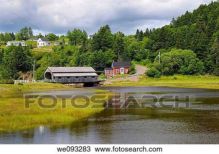 Stock Image - Covered bridge over the Irish River in St Martins New Brunswick. Fotosearch