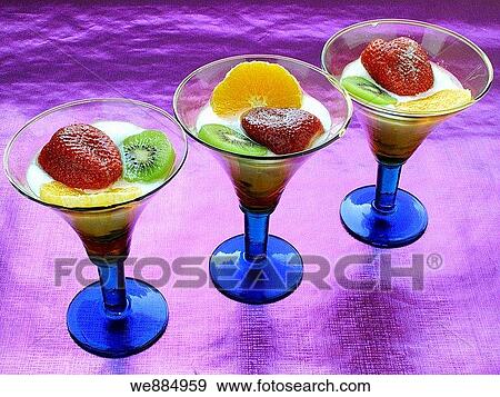 Stock Photo - Cream yogurt with fresh fruit. Fotosearch