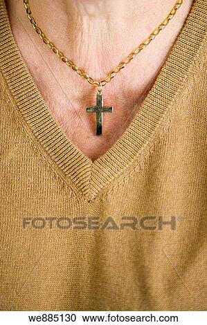 Cross on woman's neck View Large Photo Image Stock Image - Cross on woman's neck. Fotosearch