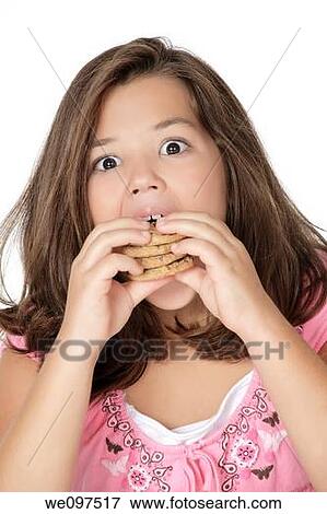 Cute Caucasian girl eating Chocolate Chip Cookies View Large Photo Image Stock Photo - Cute Caucasian girl eating Chocolate Chip Cookies. Fotosearch