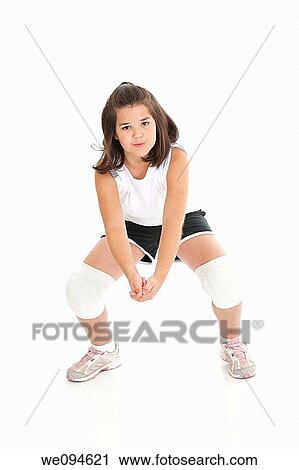 Cute Caucasian girl hitting the ball in volleyball View Large Photo Image Stock Image - Cute Caucasian girl hitting the ball in volleyball. Fotosearch