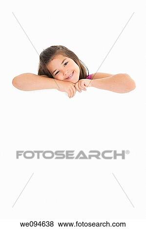 Cute Caucasian girl holding a blank sign View Large Photo Image Stock Photo - Cute Caucasian girl holding a blank sign. Fotosearch