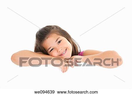 Cute Caucasian girl holding a blank sign View Large Photo Image Stock Photo - Cute Caucasian girl holding a blank sign. Fotosearch
