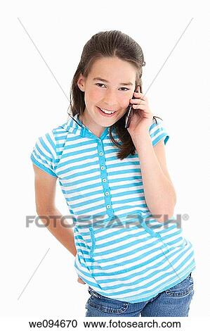Cute Caucasian girl talking on a cell phone View Large Photo Image Stock Image - Cute Caucasian girl talking on a cell phone. Fotosearch