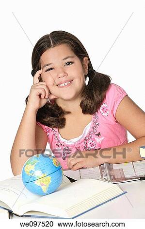 Cute Caucasian girl working on homework View Large Photo Image Stock Image - Cute Caucasian girl working on homework. Fotosearch