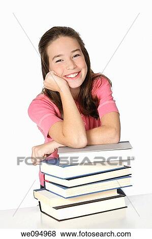 Cute Caucasian girl working on homework View Large Photo Image Stock Photo - Cute Caucasian girl working on homework. Fotosearch