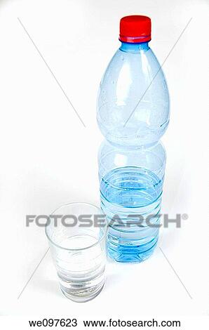 Cutout of a Plastic Bottle and glass of Mineral Water on white background View Large Photo Image Stock Image - Cutout of a Plastic Bottle and glass of Mineral Water on white background. Fotosearch
