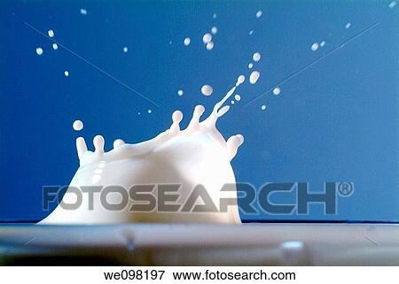 Drop of milk in a glass View Large Photo Image Stock Photo - Drop of milk in a glass. Fotosearch