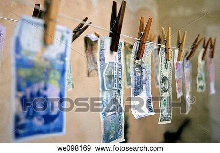Drying international banknotes on a drier View Large Photo Image Stock Photo - Drying international banknotes on a drier. Fotosearch