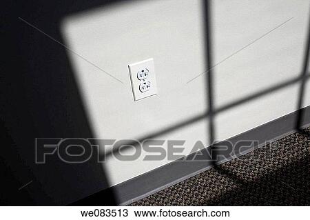 Electrical outlet being lit by sunlight. View Large Photo Image Stock Image - Electrical outlet being lit by sunlight.. Fotosearch