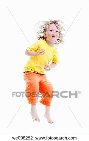 energetic boy jumping in the air - isolated on white View Large Photo Image Stock Image - energetic boy jumping in the air - isolated on white. Fotosearch