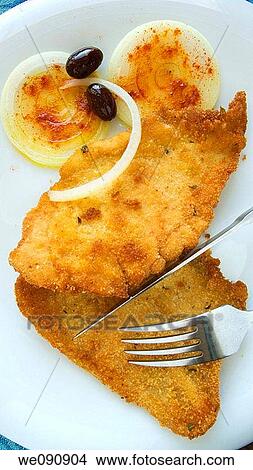 Escalope with onions and marinated olives View Large Photo Image Picture - Escalope with onions and marinated olives. Fotosearch