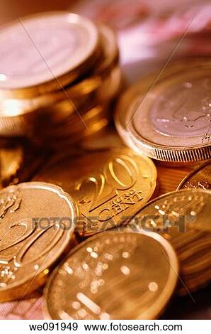 Euro coins on euro notes View Large Photo Image Stock Photo - Euro coins on euro notes. Fotosearch