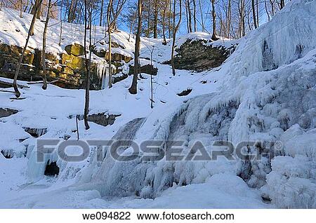 Evening sun on rock walls at frozen Sherman Falls on Ancaster Creek in winter View Large Photo Image Stock Image - Evening sun on rock walls at frozen Sherman Falls on Ancaster Creek in winter. Fotosearch