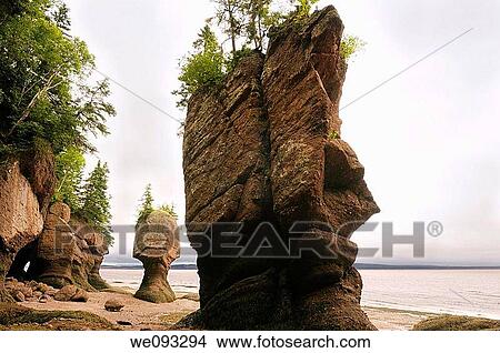 Face of ET and Motherinlaw sea stacks at Hopewell Rocks Bay of Fundy New Brunswick View Large Photo Image Picture - Face of ET and Motherinlaw sea stacks at Hopewell Rocks Bay of Fundy New Brunswick. Fotosearch