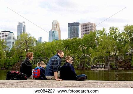 FAMILY IN MINNEAPOLIS PARK View Large Photo Image Stock Photo - FAMILY IN MINNEAPOLIS PARK. Fotosearch