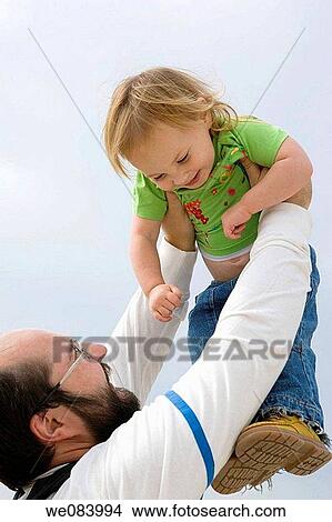 Father and daughter. View Large Photo Image Picture - Father and daughter.. Fotosearch