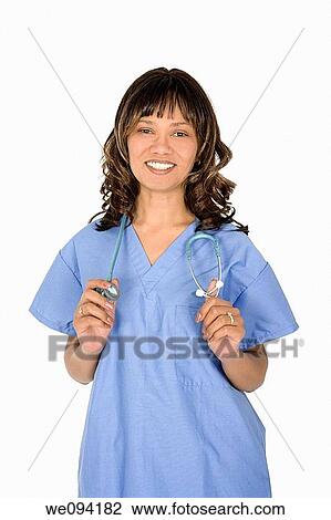 Female African American doctor or nurse holding a stethoscope on white background View Large Photo Image Stock Image - Female African American doctor or nurse holding a stethoscope on white background. Fotosearch