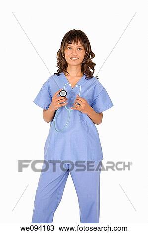 Female African American doctor or nurse holding a stethoscope on white background View Large Photo Image Stock Image - Female African American doctor or nurse holding a stethoscope on white background. Fotosearch