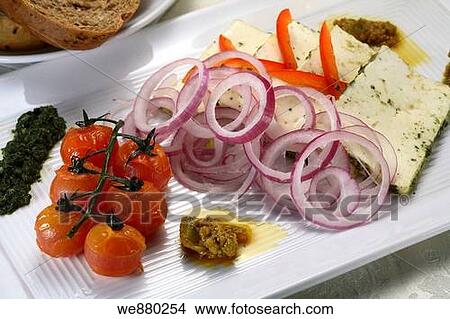 Feta cheese with spinach, cherry tomatoes and onion rings, Greek cuisine. View Large Photo Image Picture - Feta cheese with spinach, cherry tomatoes and onion rings, Greek cuisine.. Fotosearch