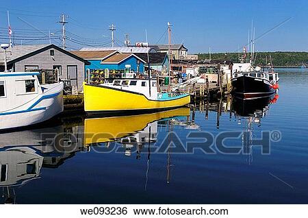 Fishing boats and lobster traps at Fishermans Cove Eastern Passage Halifax Nova Scotia View Large Photo Image Stock Photograph - Fishing boats and lobster traps at Fishermans Cove Eastern Passage Halifax Nova Scotia. Fotosearch