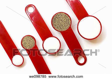 Five red measuring spoons, from a tablespoon to a quarter teaspoon, filled with salt and pepper arranged in a geometric pattern on a white background View Large Photo Image Stock Photography - Five red measuring spoons, from a tablespoon to a quarter teaspoon, filled with salt and pepper arranged in a geometric pattern on a white background. Fotosearch