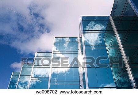 Five towers of a sleek modern glass office building in Silicon Valley with the clouds and sky reflecting on the surface of the buildings. San Mateo, California, USA. View Large Photo Image Stock Image - Five towers of a sleek modern glass office building in Silicon Valley with the clouds and sky reflecting on the surface of the buildings. San Mateo, California, USA.. Fotosearch