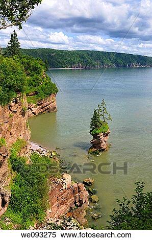 Flowerpot Rock and coast at Fownes Head lookout on the Fundy Trail Parkway New Brunswick View Large Photo Image Stock Photography - Flowerpot Rock and coast at Fownes Head lookout on the Fundy Trail Parkway New Brunswick. Fotosearch