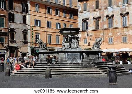 Stock Photography - Fountain in the centre of Piazza di Santa Maria in Trastevere, Rome. Lazio, Italy. Fotosearch