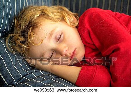 France portrait of a three years old baby girl sleeping on a sofa in the living room View Large Photo Image Stock Image - France portrait of a three years old baby girl sleeping on a sofa in the living room. Fotosearch