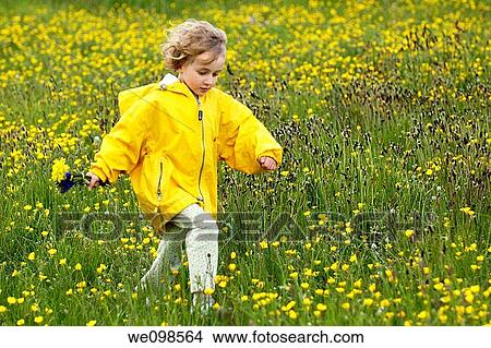 France provence little girl running in a meadow at spring View Large Photo Image Picture - France provence little girl running in a meadow at spring. Fotosearch