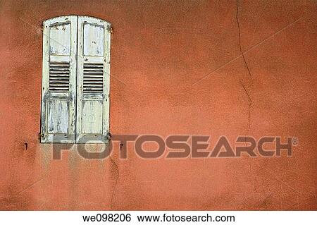 France provence luberon bonnieux village a closed window shutter on a cleaved ochre wall View Large Photo Image Stock Photograph - France provence luberon bonnieux village a closed window shutter on a cleaved ochre wall. Fotosearch
