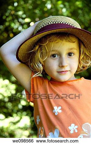 France provence portrait of a smiling little girl wearing her mother s straw hat View Large Photo Image Stock Photograph - France provence portrait of a smiling little girl wearing her mother s straw hat. Fotosearch
